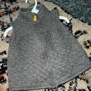 light grey vest